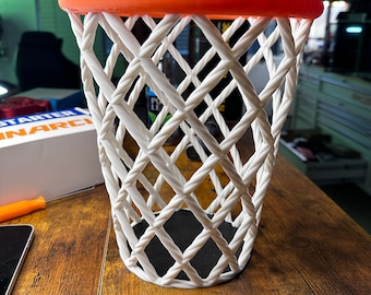 Ballin&#39; Desktop Wastebasket: Bring the fun and excitement of basketball to your office or home with this ballin&#39; desktop wastebasket. Swish!