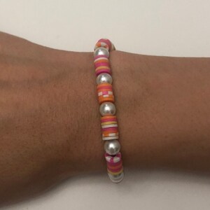 pearl  and clay bead braclet