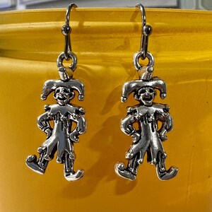 Heath ledger earrings hotsell