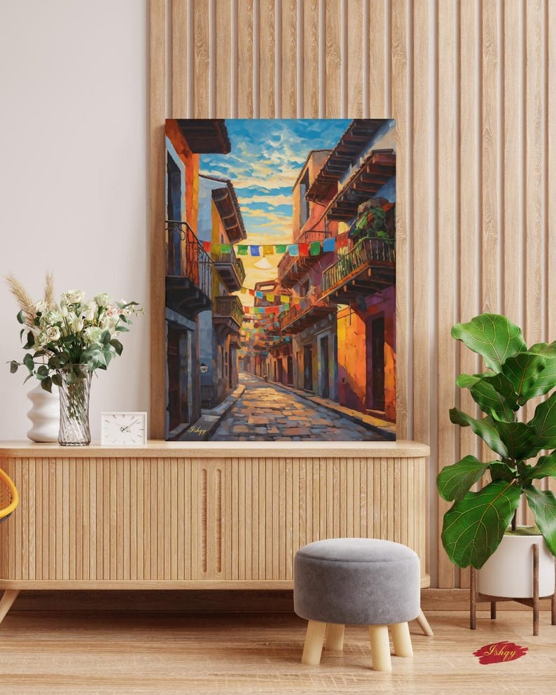 Jalisco Street Wall Art, Colorful Mexico Canvas Print, Papel Picado Decor, Mexican Street Scene, Latin Travel Art, Boho Framed Canvas Gift
Mexican Street Canvas Wall Art, Jalisco Architecture Painting Print, Colorful Framed Canvas, Mexico Wall Decor, Gift for Her, Art Print.Bring golden Mexican streets into your space with this vibrant Jalisco wall art print, glowing with colonial charm