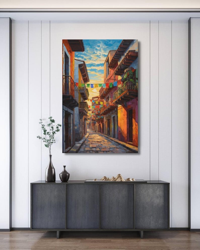 Jalisco Street Wall Art, Colorful Mexico Canvas Print, Papel Picado Decor, Mexican Street Scene, Latin Travel Art, Boho Framed Canvas Gift
Mexican Street Canvas Wall Art, Jalisco Architecture Painting Print, Colorful Framed Canvas, Mexico Wall Decor, Gift for Her, Art Print.Bring golden Mexican streets into your space with this vibrant Jalisco wall art print, glowing with colonial charm