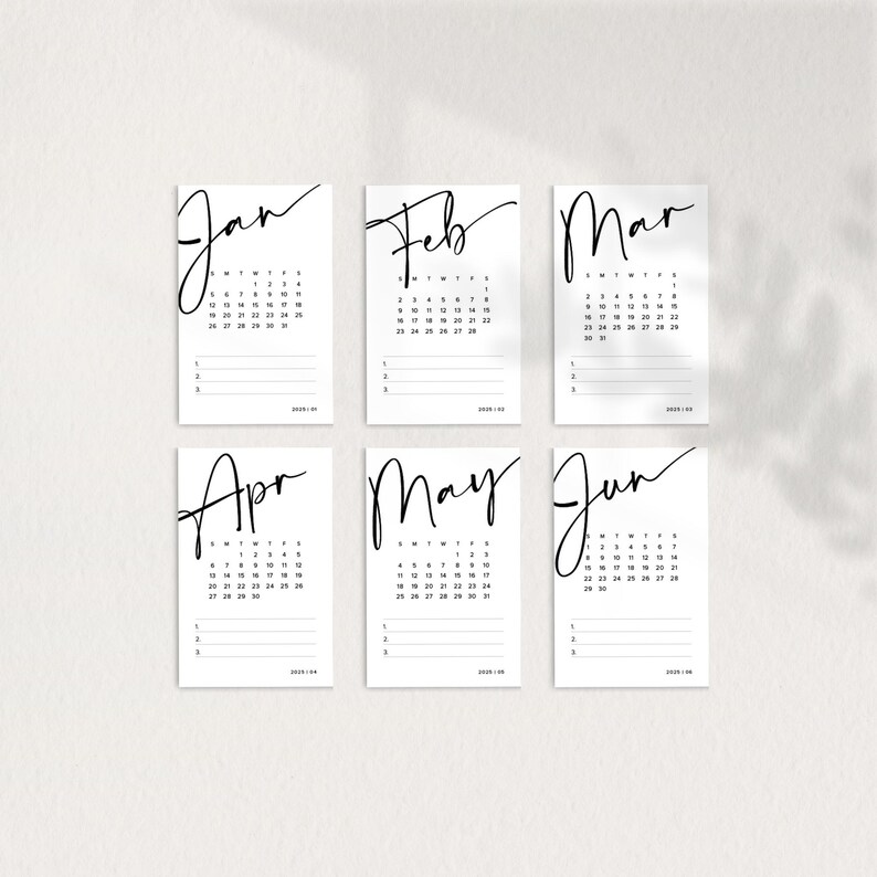 May include: A set of six printable calendar cards for the months of January through June. Each card features a simple black and white design with the month's name written in a handwritten font.