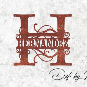 May include: A rusty red metal monogram with the letter "H" and the name "HERNANDEZ" in a decorative font. The monogram is decorated with ornate scrollwork.