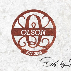 May include: A rusty red metal monogram with the letter "O" in a circle, the name "OLSON" and the text "EST 2005".