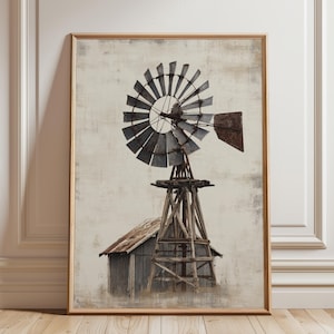 May include: Framed print of a rustic windmill with a weathered wooden structure and a small shed. The windmill's blades are made of metal, and the artwork has a vintage, distressed aesthetic, with a neutral color palette.