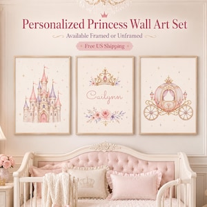 May include: A set of three wall art prints featuring a pink castle, a gold crown above the name Cailynn with floral accents, and a pink carriage. The text reads Personalized Princess Wall Art Set, Available Framed or Unframed, Free US Shipping.