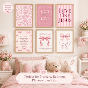 May include: A set of six framed wall art prints in shades of pink and white. The prints feature floral patterns, striped backgrounds, and religious text including 'God is Love', 'Love Like Jesus', and various Bible verses alongside illustrations of bows.