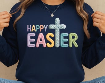 May include: Navy blue sweatshirt with the words "HAPPY EASTER" in pastel-colored, textured letters and a light blue cross. The sweatshirt is a crew neck style.