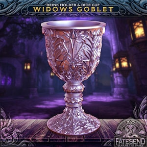 May include: Ornate silver goblet with intricate floral and spiderweb designs. The goblet is a drink holder and dice cup, with the text "WIDOWS GOBLET" at the top. The base has the text "FATESEND YEAR OF THE SNAKE 2025".
