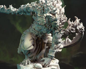 May include: A detailed, light-colored sculpture of a mythical creature with flame-like hair and a clawed hand holding a curved blade. The figure is kneeling on a rocky base, with intricate armor and a fierce expression.