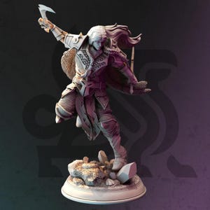 May include: A white painted figurine of a warrior with long hair, wearing chainmail armor and holding a sword and a dagger. The figurine is standing on a round base with a textured surface.