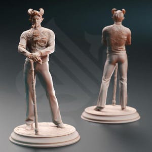 May include: A detailed figurine of a devilish figure with horns, wearing a patterned jacket and pants, holding a cane. The figurine is standing on a circular base.