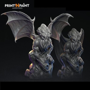 May include: Two gray miniature statues of a winged creature with a tentacled face, seated on a rocky base. The statues have large, detailed wings and muscular bodies. The text "PRINT 'N PAINT MINIATURES" is in the upper left corner.