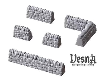 May include: A set of five gray miniature stone wall segments for wargaming, including four straight sections of varying lengths and one corner piece. The text Vesna wargaming scenery is printed in black in the lower right corner.