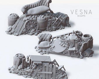 May include: Three gray miniature terrain pieces by VESNA SCULPTS featuring debris piles with a chaise lounge, a wooden chair, a table, barrels, a wagon wheel, and broken wooden fencing. These detailed resin-style models depict ruined structures.