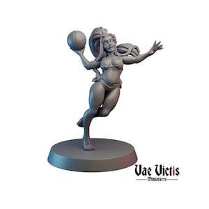 May include: A gray 3D printed miniature of a woman wearing a bikini and holding a ball. She is standing on a round base. The miniature is part of a set of miniatures for tabletop games.