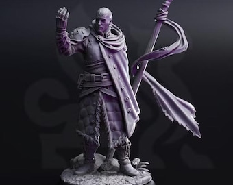 May include: A purple-toned miniature figurine of a warrior standing on a rocky base. The figure wears layered armor, a long cloak, and holds a tall spear with a flowing banner. One hand is raised with fingers spread, and the head is shaved.