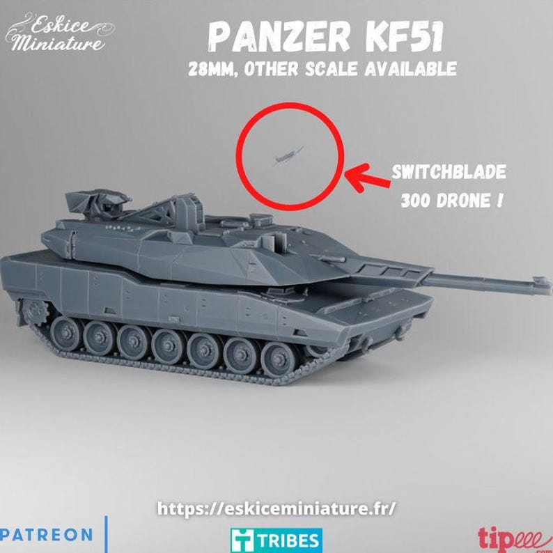May include: A gray Panzer KF51 model tank with a long barrel and detailed tracks. The text "PANZER KF51" and "28MM, OTHER SCALE AVAILABLE" are visible. A smaller image of a drone is circled with the text "SWITCHBLADE 300 DRONE !"