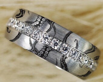 May include: A silver band with a row of small diamonds and an engraved octopus design.