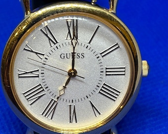 Guess-dresswatch: tweedehands, nieuw bandje en batterij
