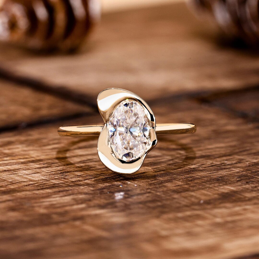Oval Bezel Set Moissanite Engagement Ring | 14K Yellow Gold Modern ...
