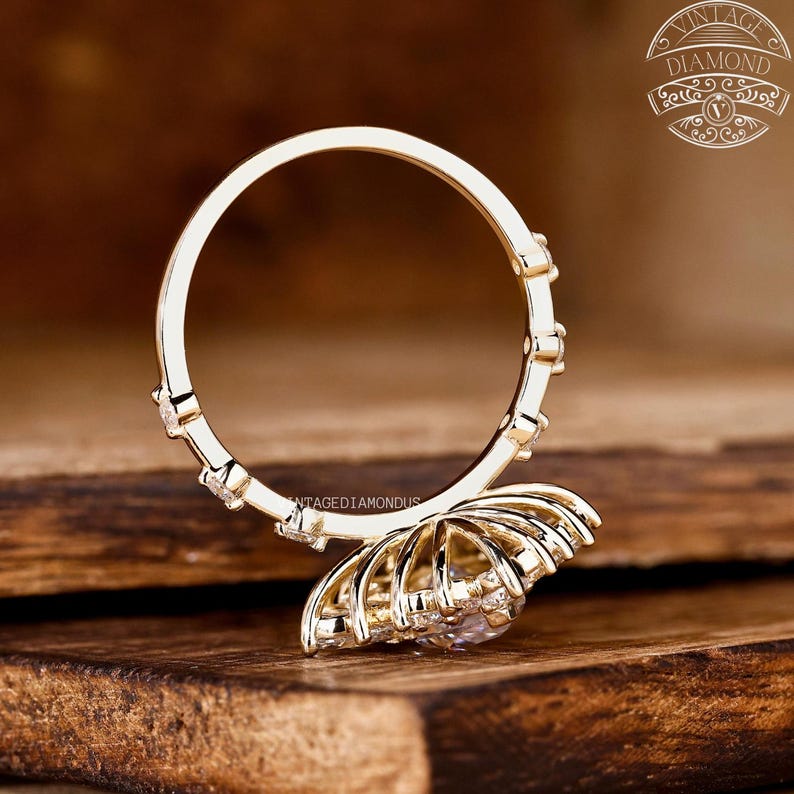 Handcrafted yellow gold engagement ring with a marquise center lab-grown diamond encircled by a floral halo of lab diamonds. The combination of shape, symmetry, and brilliance gives this ring a classic yet modern look suitable for eco-conscious brides.