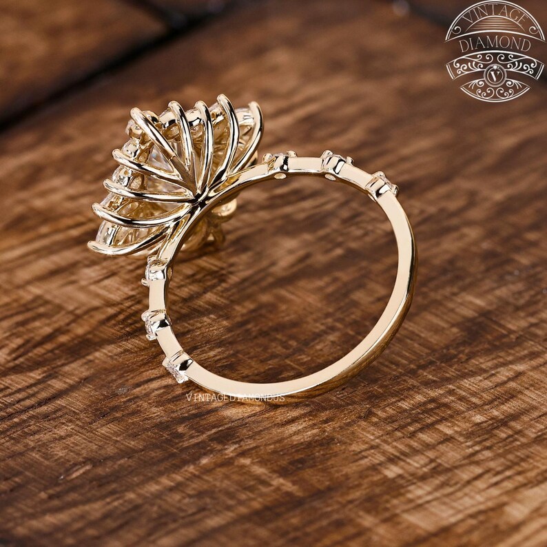 Marquise lab-grown diamond halo engagement ring showcasing a 1.00 CT center diamond and floral halo in polished yellow gold. The ring delivers exceptional sparkle, geometric detail, and ethical luxury, making it an ideal choice for engagements, anniversaries, or gifting.
