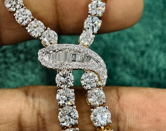 14K Gold Moissanite Knot Necklace: Baguette Halo Pendant