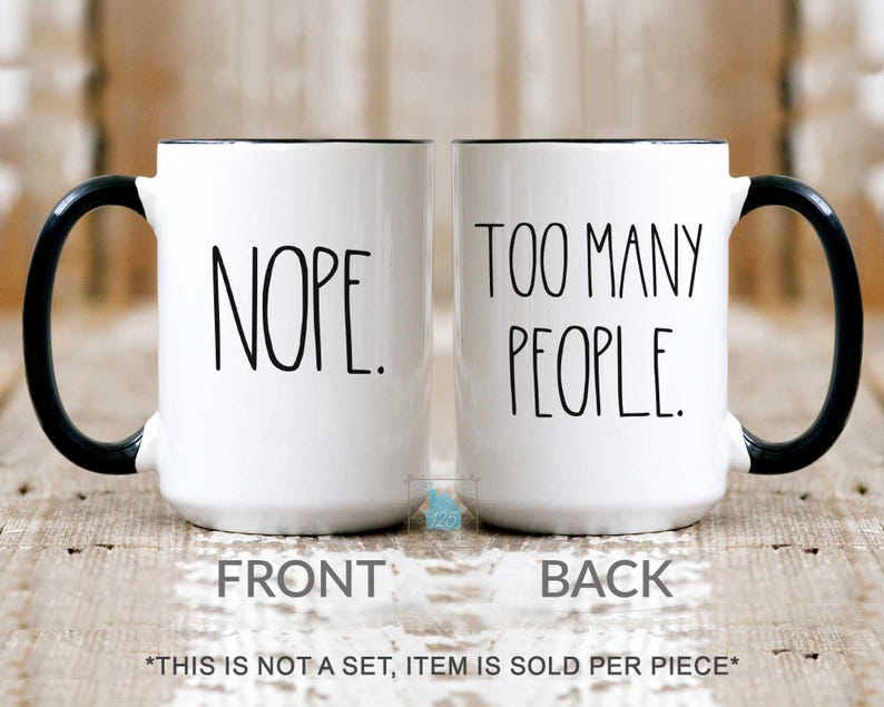 May include: A set of three ceramic mugs with a speckled, matte finish. The mugs are in shades of cream, light gray, and dark gray. Each mug has a simple, minimalist design, perfect for coffee or tea.