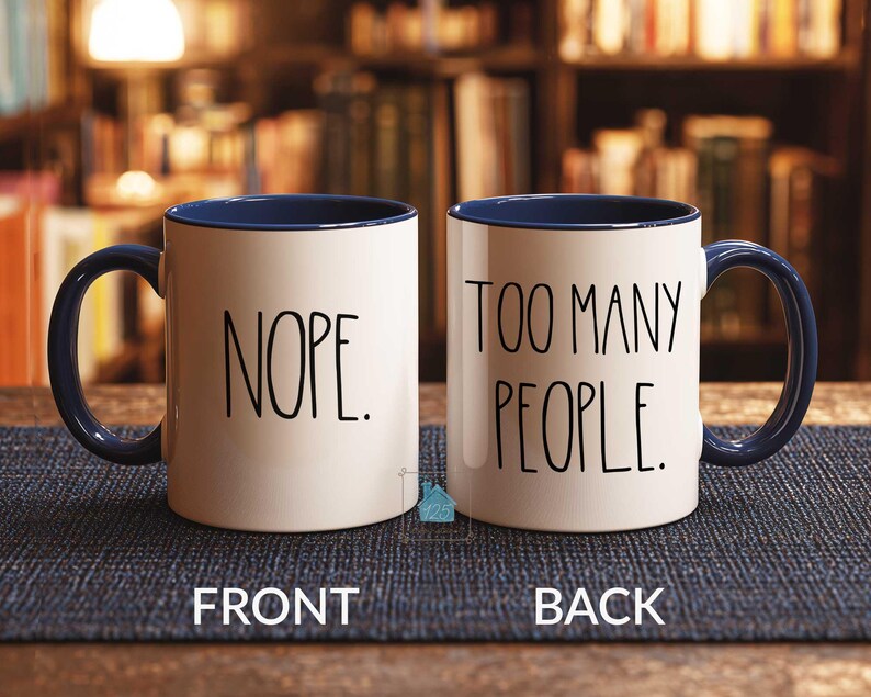 May include: A set of three ceramic mugs with a speckled, matte finish. The mugs are in shades of cream, light gray, and dark gray. Each mug has a simple, minimalist design and a rounded handle.