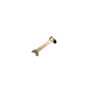 May include: A silver-coloured metal tool with the text "GoS No.1" printed on it. The tool has a curved shape with a small, rounded end and a larger, flared end. The tool is designed for a specific purpose.