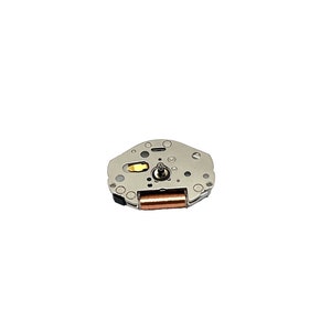 May include: A silver watch movement with a copper winding barrel and a gold-coloured lever.
