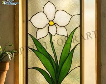 May include: A stained glass window panel featuring a white daffodil with yellow center and green leaves. The panel is framed in a brown wood frame.
