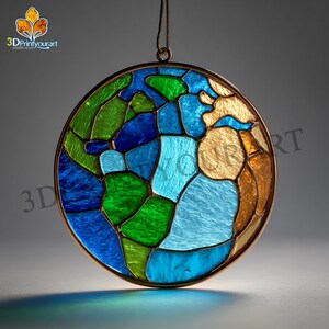 May include: A round stained glass ornament with a copper-colored frame. The design features a mosaic of blue, green, and gold-toned glass, resembling a stylized globe. A thin chain is attached for hanging. The logo "3DPrintyourart" is visible in the upper left corner.