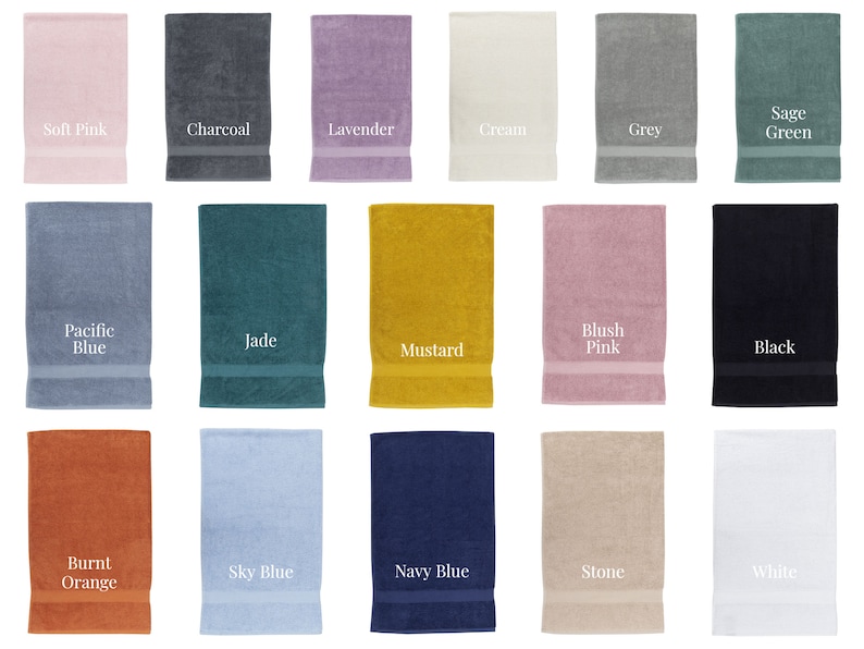 May include: A collection of 15 bath towels in various colors, including soft pink, charcoal, lavender, cream, grey, sage green, pacific blue, jade, mustard, blush pink, black, burnt orange, sky blue, navy blue, stone, and white.