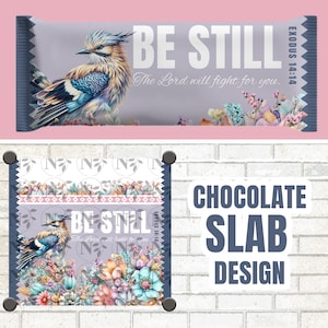 May include: A chocolate slab design featuring a detailed illustration of a bird with blue, brown, and white feathers, surrounded by colorful flowers. The text "BE STILL" and "The Lord will fight for you" are displayed on the design.