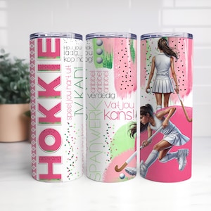 May include: Three stainless steel tumblers with a hockey theme. One tumbler features the word "HOKKIE" in pink and green. The other two tumblers have illustrations of hockey players and text in a similar color scheme.
