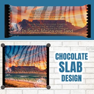May include: Chocolate slab design featuring a scenic landscape with text in English and Afrikaans. The design includes a mountain range, ocean, and sunset colors. The text reads "In South Africa our land."