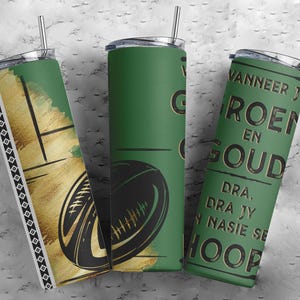 May include: Three green insulated tumblers with black and gold designs. One tumbler features a rugby ball graphic, another has text, and the third has a gold and black pattern. Each tumbler has a silver straw.