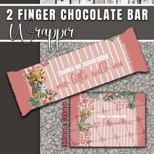 May include: A pink and white striped chocolate bar wrapper with a cheetah cub illustration and the text "Thanks for celebrating our little wild one." The wrapper measures 140mm x 100mm.