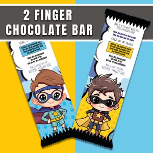 May include: Two colorful chocolate bar wrappers with superhero illustrations. The wrappers feature cartoon superheroes with capes and masks. Text at the top reads "2 FINGER CHOCOLATE BAR". The wrappers have text bubbles with inspirational messages.