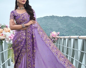 Purple  tissue Silk with Embroidery,stone,pearl,mirror work on border with zari weaving across all over saree