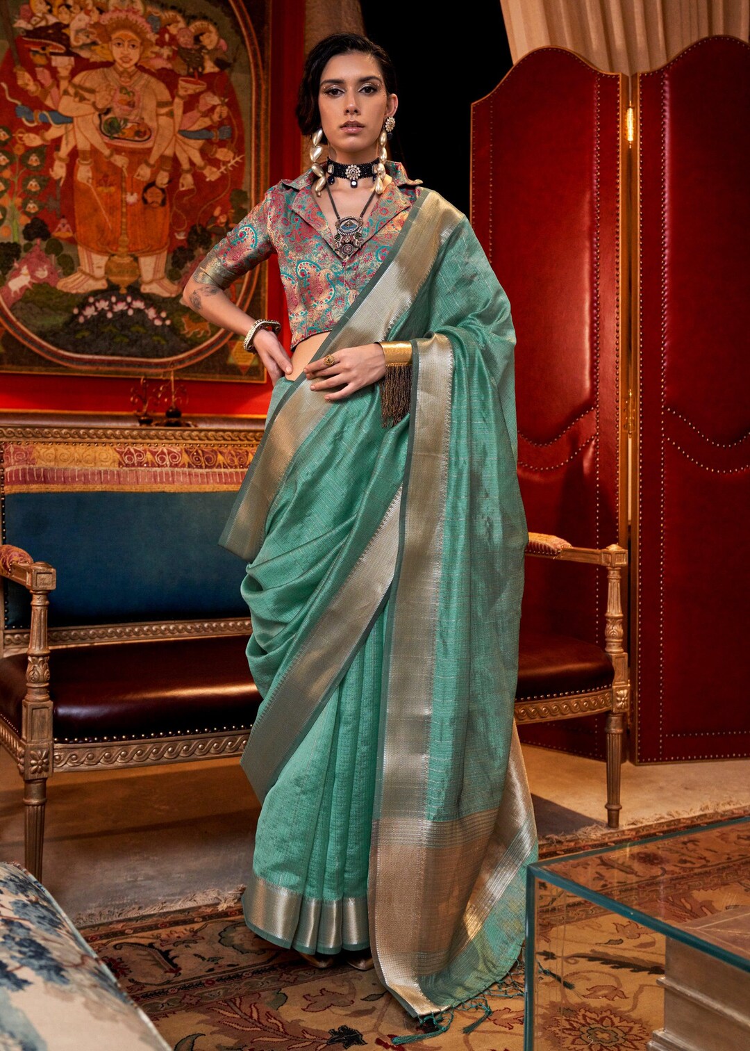 Women's Chiffon Light Green Zari Embroidered Designer Saree With Blouse Piece