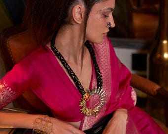 Dark Pink Khadi Georgette Banarasi Weaving Saree with matching blouse, zari woven border and flowers design all over saree and rich pallu