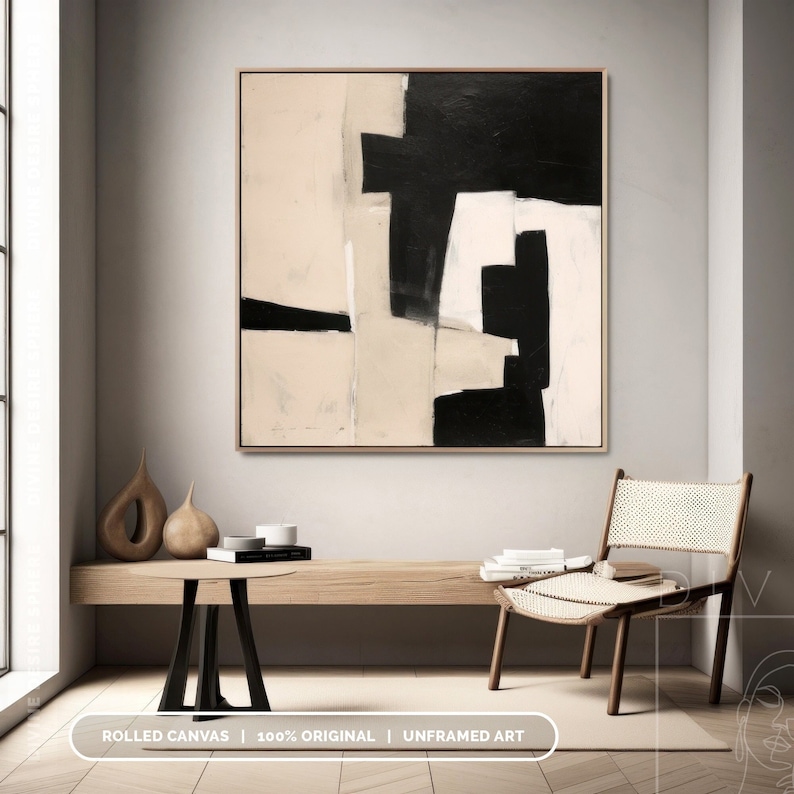 Neutral abstract painting with large black shapes and soft beige textures forming a balanced and modern minimalist design.