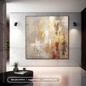 a painting hanging on a wall in a living room