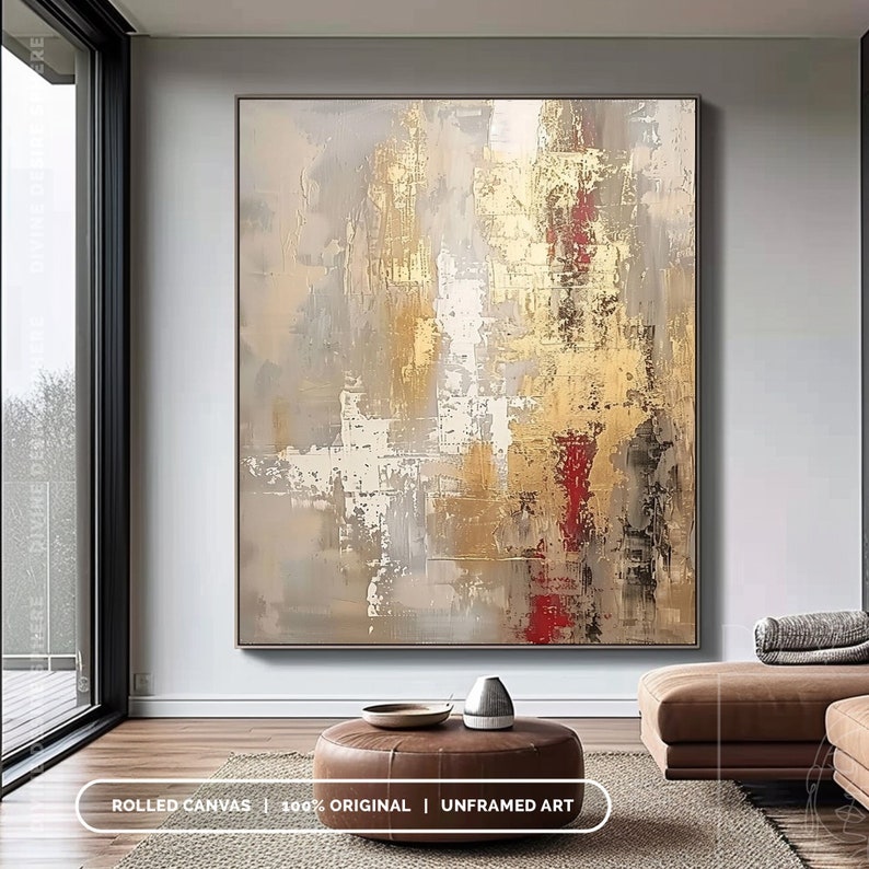 A grunge-style abstract artwork in beige, cream, and gold tones with rough textures and vertical streaks, accented by bold patches of deep red.