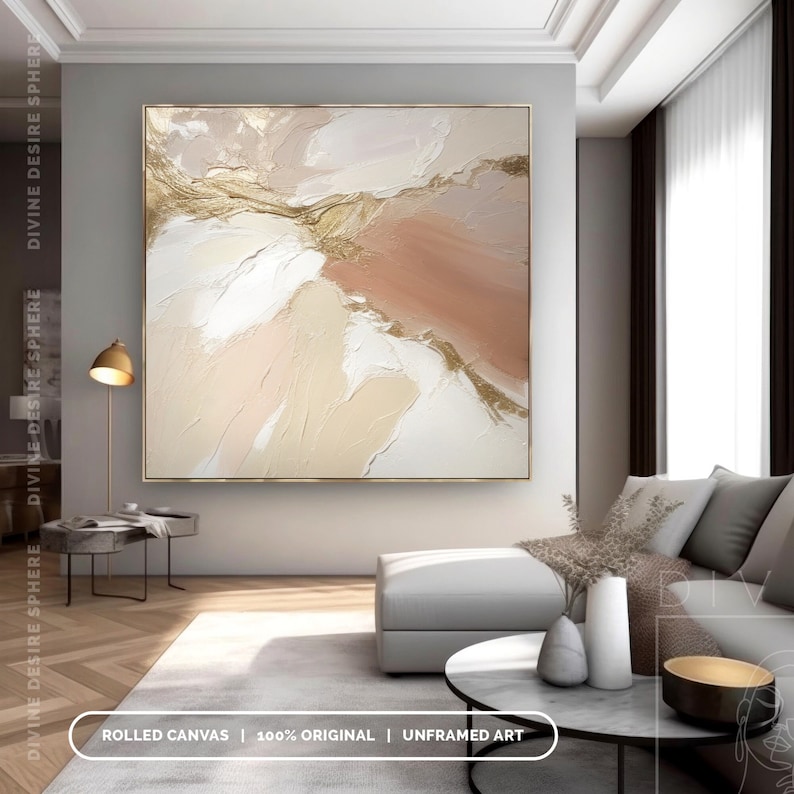 May include: Abstract art piece with a gold frame. The artwork features a textured design with shades of white, beige, and peach, accented with gold leaf. The text at the bottom reads "ROLLED CANVAS | 100% ORIGINAL | UNFRAMED ART."