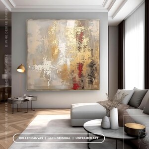 a living room with a large painting on the wall