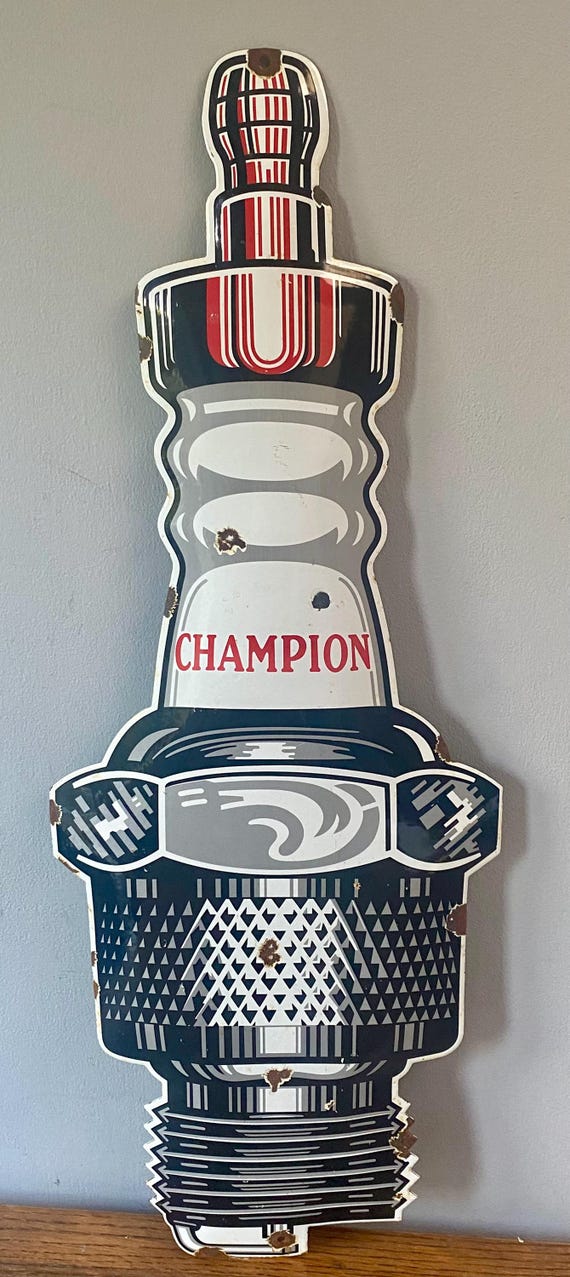 Champion Spark Plug Enamel Sign: Vintage Auto Dealer Advertising